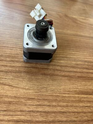 Motor de avance de papel OEM W410494 W410494-01 W410494-02 Pieza de repuesto compatible con minilabs de fotografía digital Noritsu QSS3201 Motor de transporte de papel proveedor